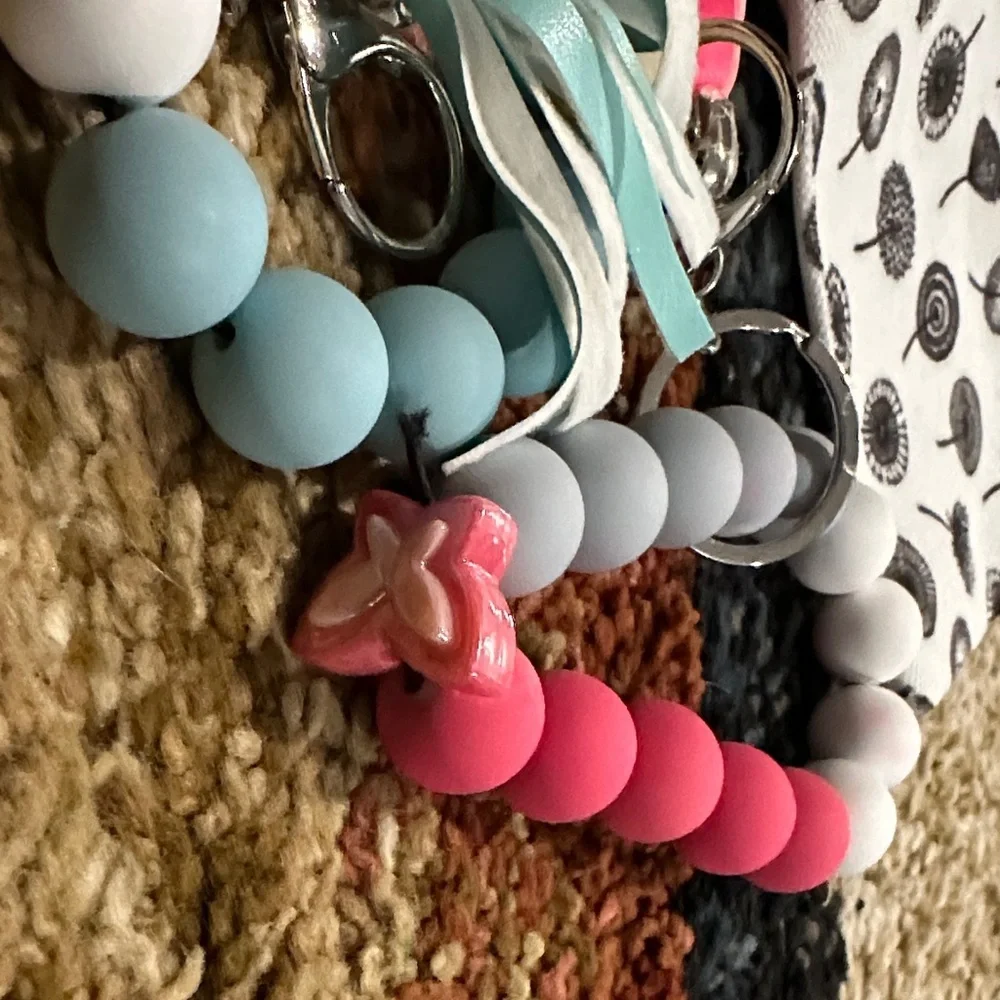 Accessory Set of 4 Includes 2 Small Zip Pouches & 2 Silicone Keychain Bracelets